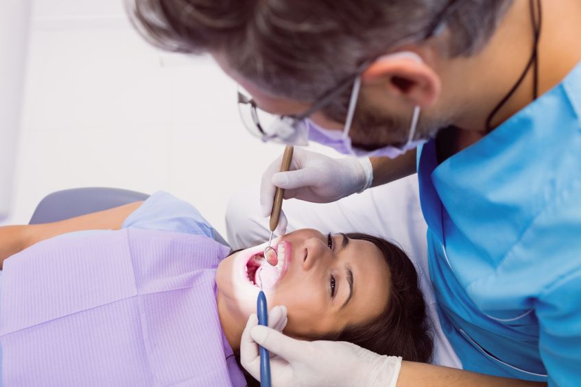 Cost and Reasons for Tooth Extraction