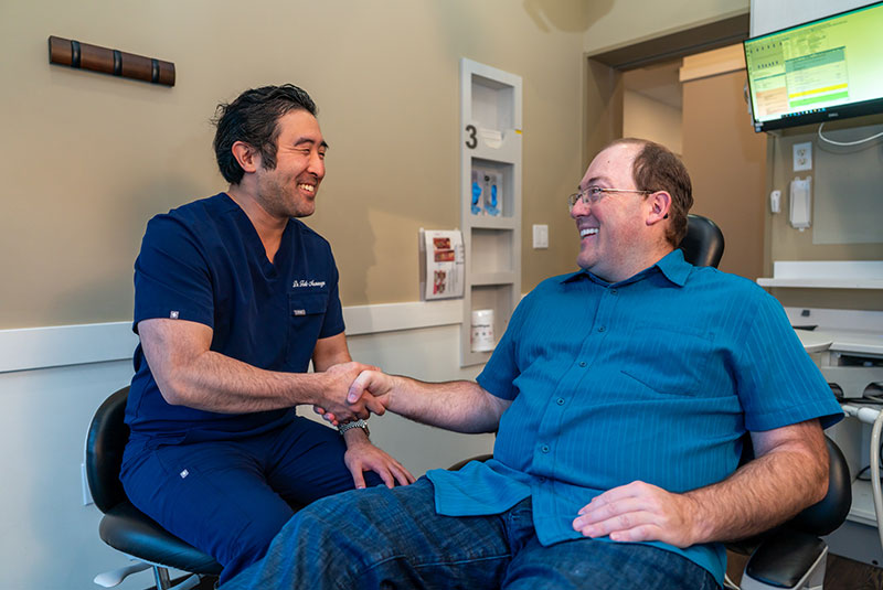 Doctor shaking hands with Patient