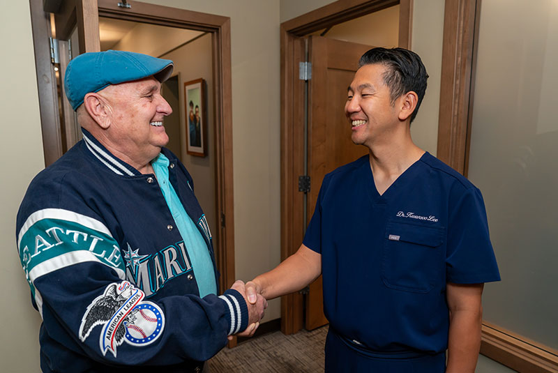 doctor shaking patients hand