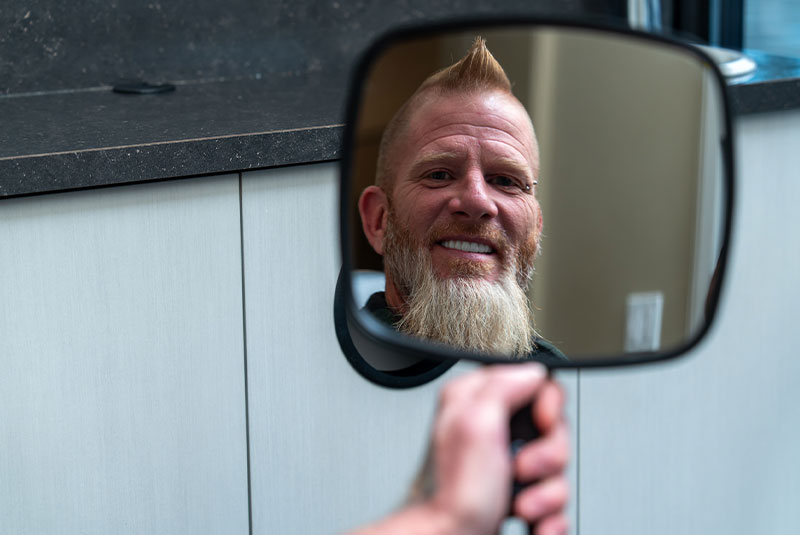 Patient looking into mirror