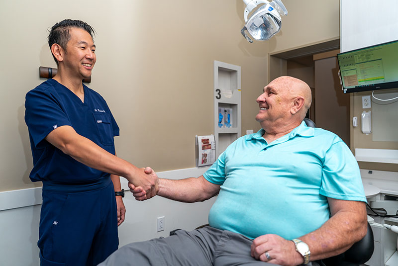 Doctor shaking hands with Patient