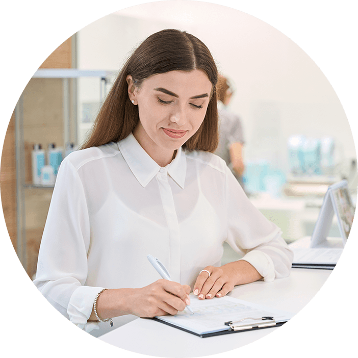 person filling out paperwork